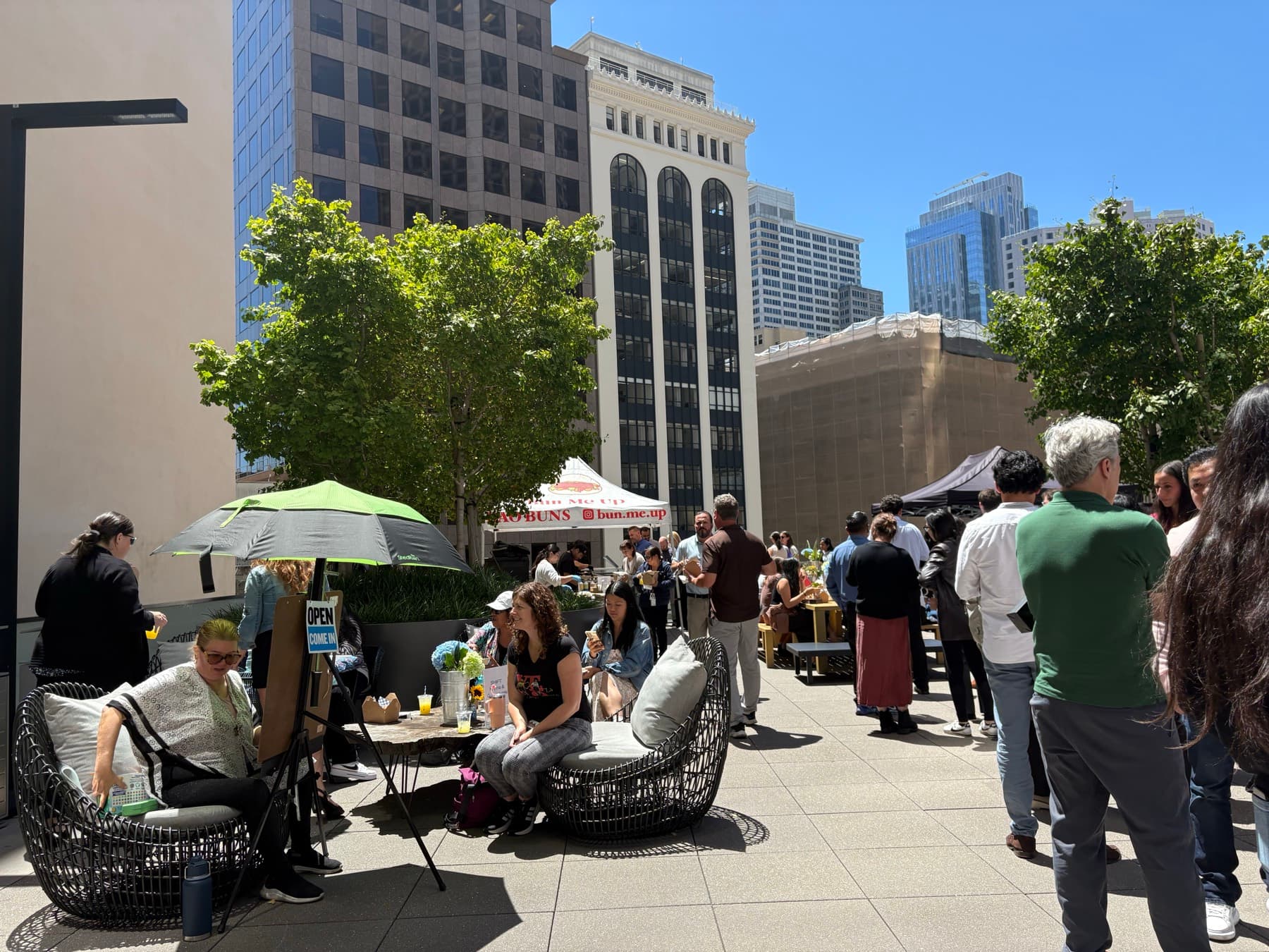 Busy courtyard event at a Class A office tower