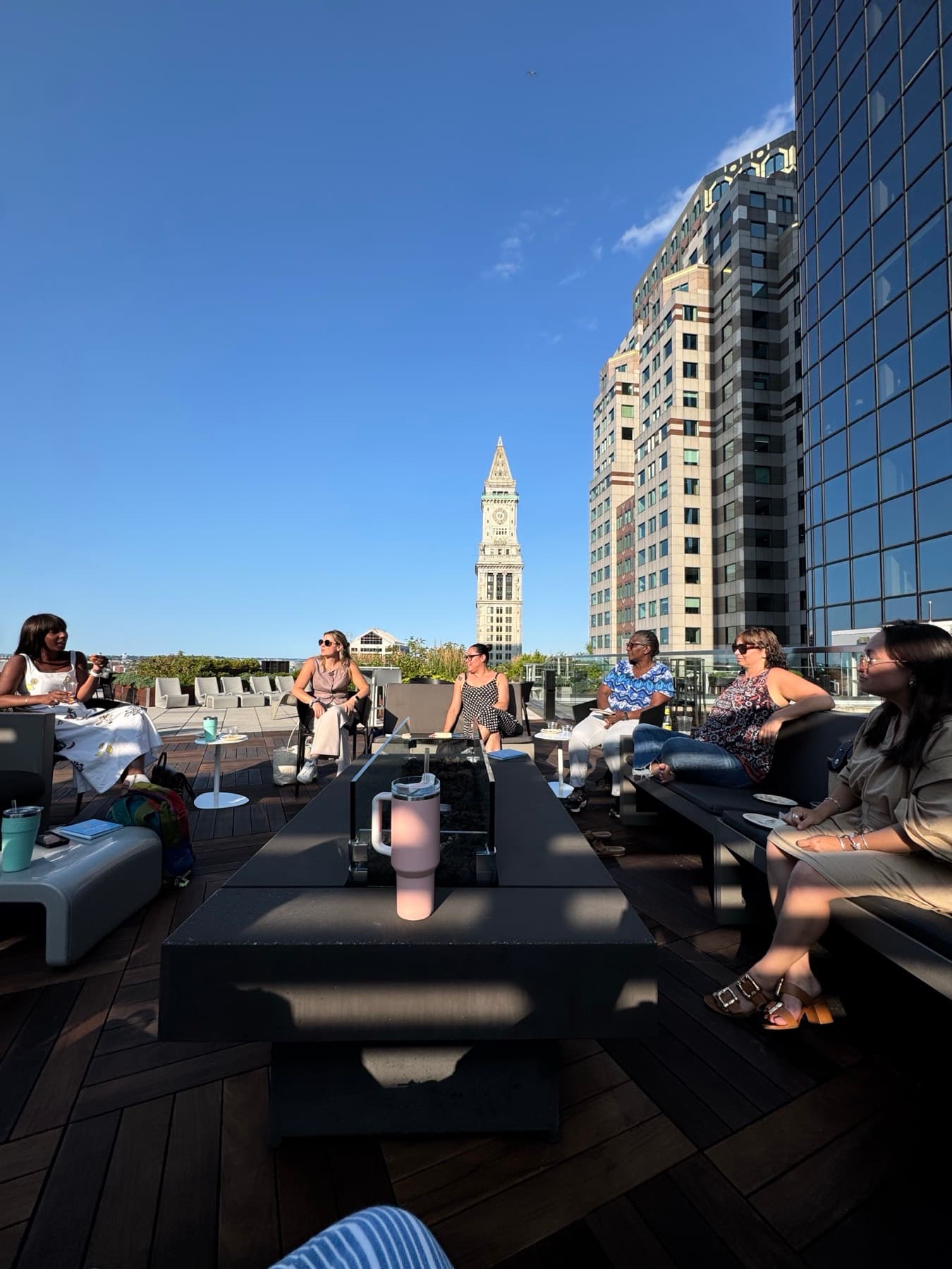 Rooftop event with the city skyline behind